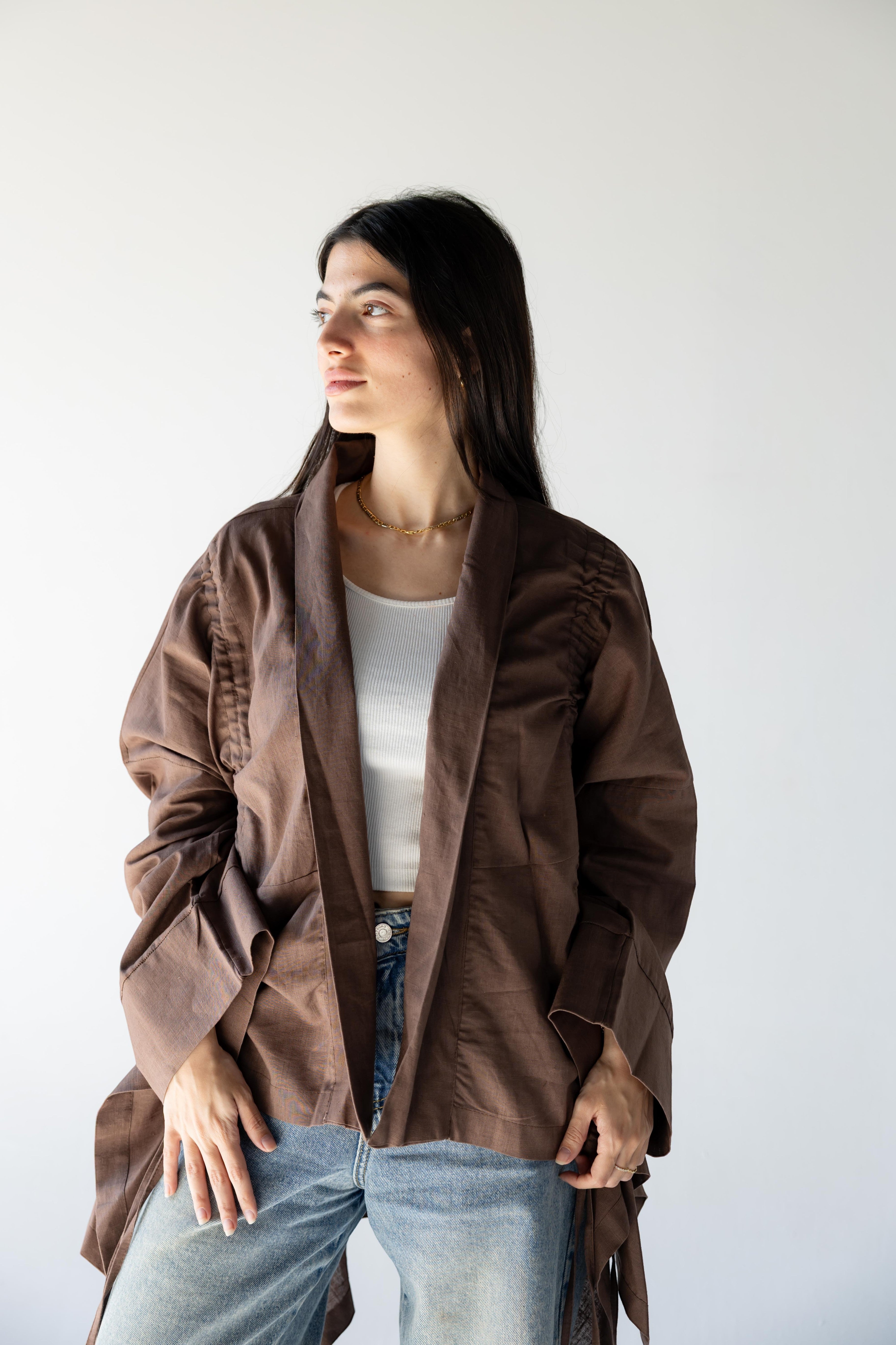ZONA Alma-Mocha Dune 100% linen jacket in earthy brown with statement sleeves and flowing details.