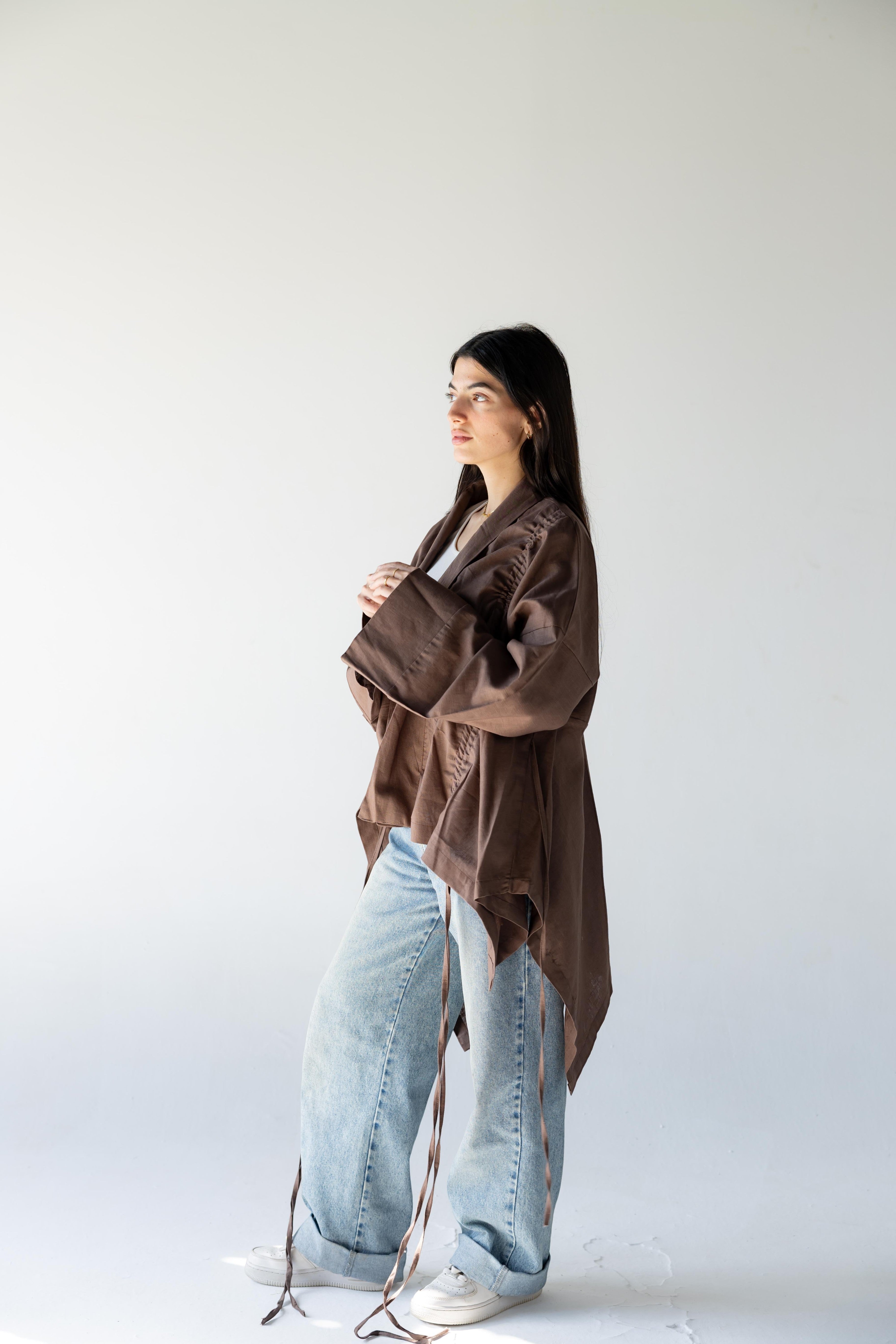 ZONA Alma-Mocha Dune 100% linen jacket in earthy brown with statement sleeves and flowing details.