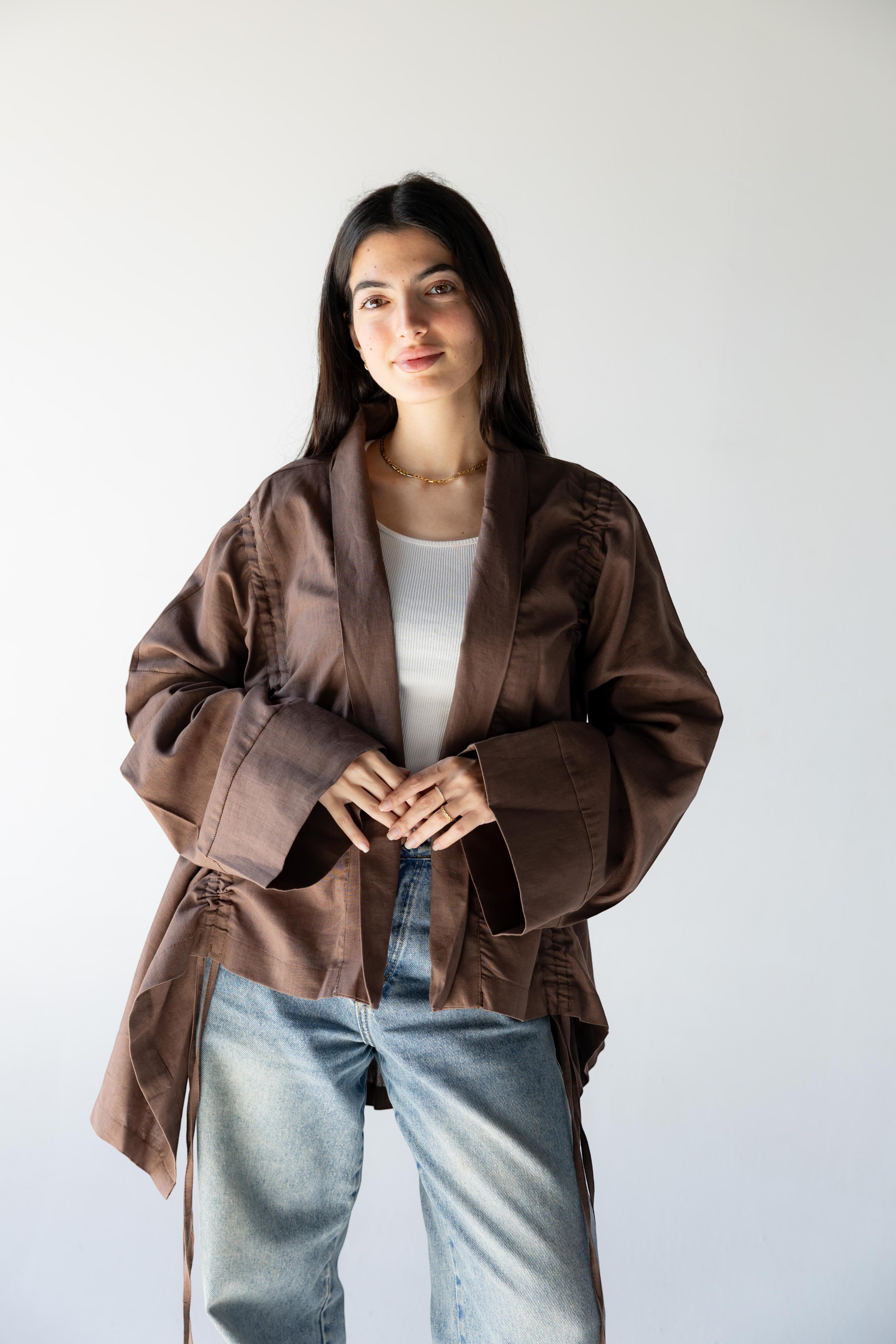 ZONA Alma-Mocha Dune 100% linen kimono jacket in earthy brown with statement sleeves and tie details.