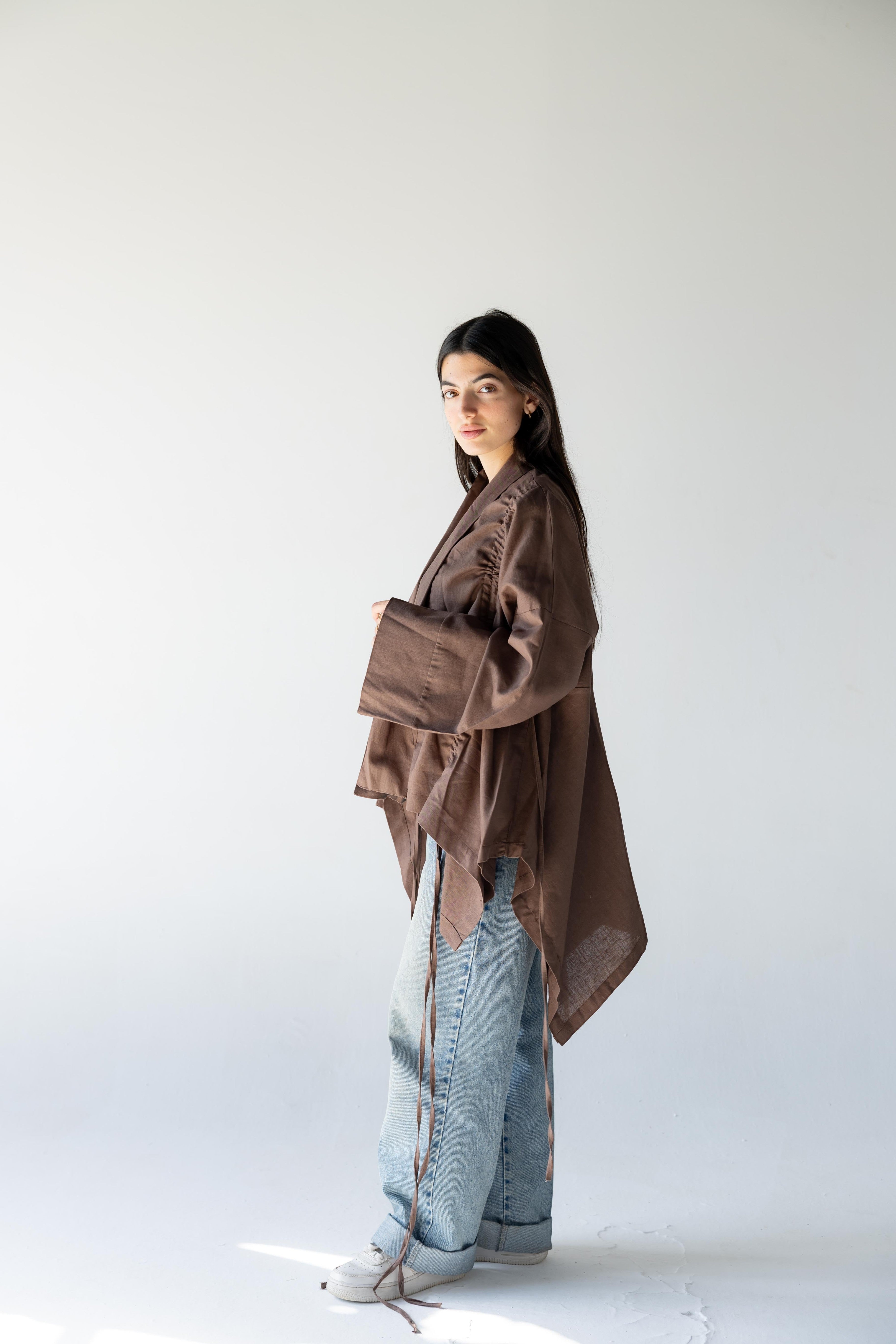 ZONA Alma-Mocha Dune 100% linen flowing top with statement sleeves in earthy brown.